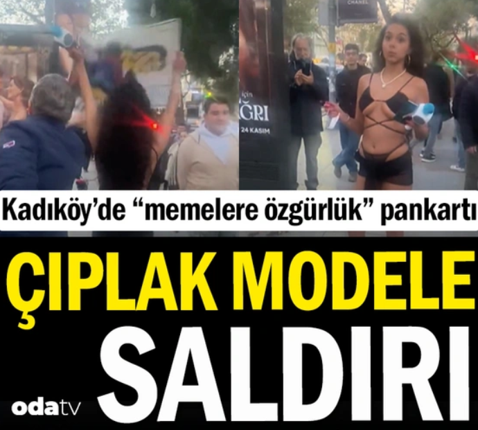 caddede yürüyen çıplak kız” memelere özgürlük” diye yürüdü bir erkek tepki gösterdi